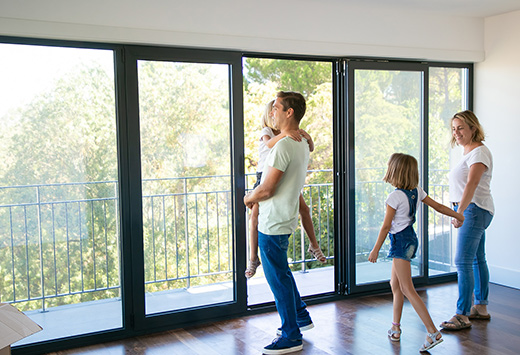 Beautiful family behind the sliding doors